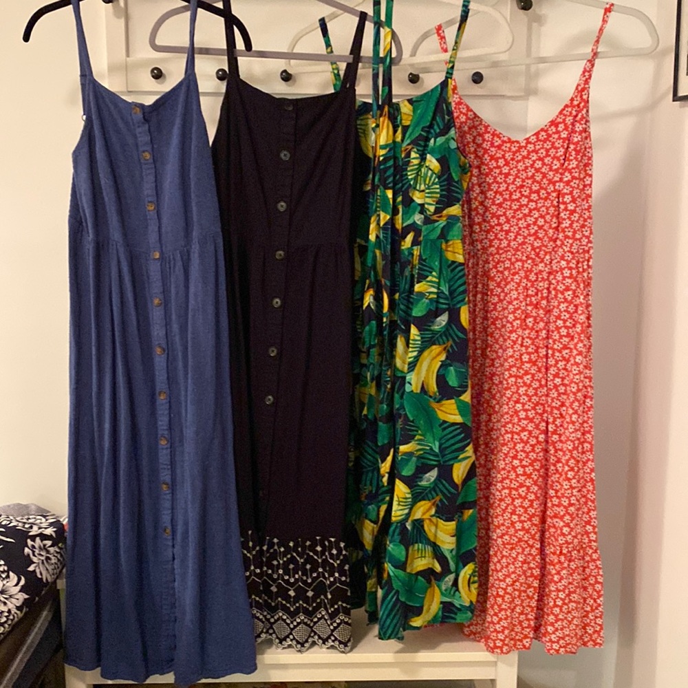 4 medium Old Navy Sundresses. All have adjustable straps. EUC.